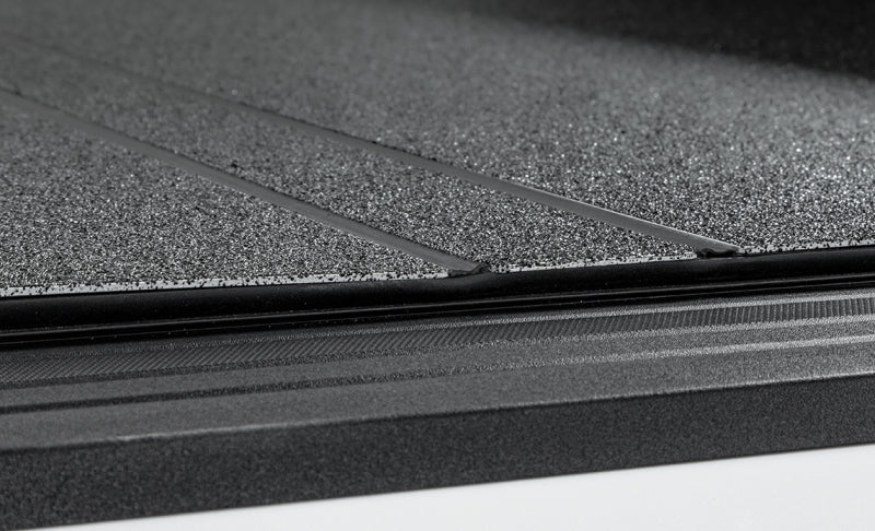Access LOMAX Tri-Fold Hard Tonneau Cover for 2022-2023 Toyota Tundra 5' 6" Bed with Deck Rail, Urethane Finish