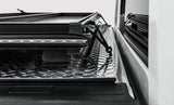 Access LOMAX Tri-Fold Hard Tonneau Cover for 2022-2023 Toyota Tundra 5' 6" Bed with Deck Rail, Urethane Finish