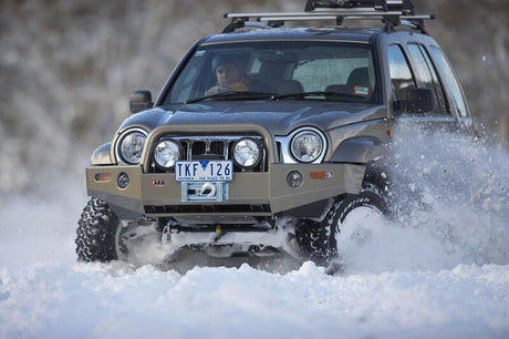 ARB Combar 02-05 Jeep Cherokee KJ Front Winch Bumper with Steel Construction and Integrated Features