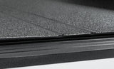 Access LOMAX Tri-Fold Hard Tonneau Cover for 2022-2023 Toyota Tundra 5' 6" Bed with Deck Rail, Urethane Finish